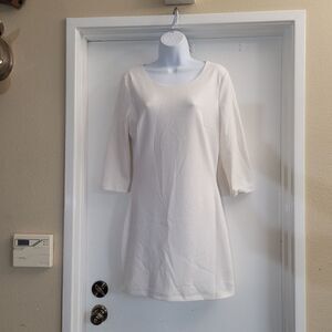 Marciano white dress with gold thread throughout and a gold zipper